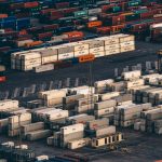 Shipping containers in a port Unsplash 1